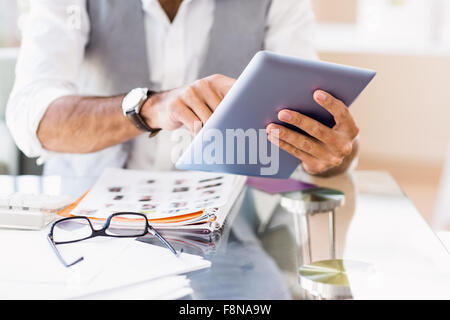 Close up of man using tablet Stock Photo
