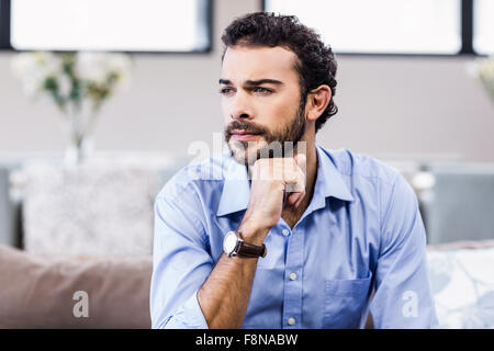 Thoughtful man looking away Stock Photo