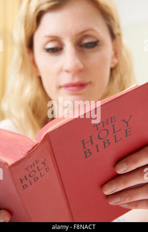Young Woman Studying Bible Stock Photo