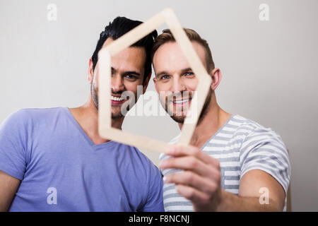Gay couple moving into new home Stock Photo