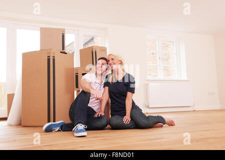 Couple Moving Into New Home Together Stock Photo
