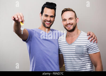 Gay couple moving into new home Stock Photo