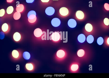 Defocused christmas lights. New Year bokeh. Abstract background for holiday design Stock Photo