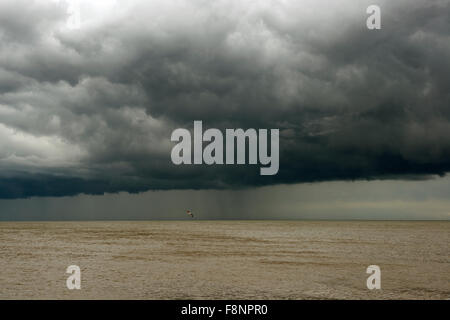 Rain clouds over North Sea, Aldeburgh Suffolk UK Stock Photo
