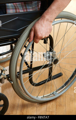 Close Up Of Man Using Crutches Stock Photo