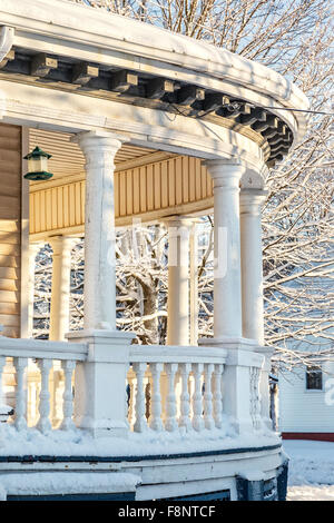 Porch of an older heritage home after a snowfall. Stock Photo