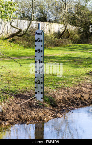 River water level gauge below dam flow pipe discharge US Corps of ...