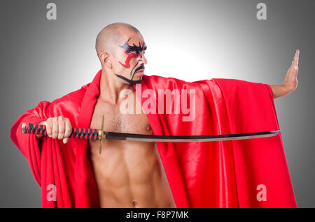 Man with sword isolated on white Stock Photo
