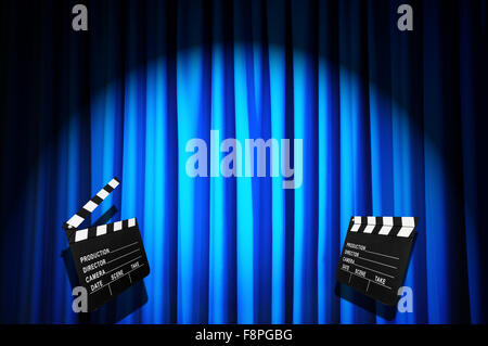 Movie clapper board against curtain Stock Photo