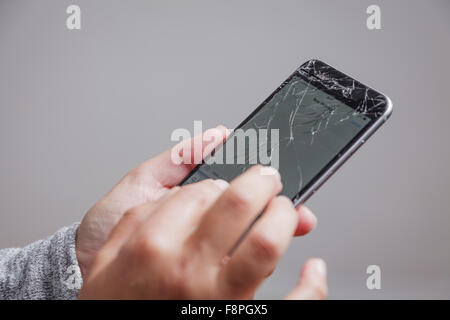 Smart phone with cracked screen Stock Photo