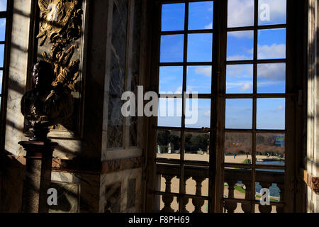 Bright sunlight casts shadows out of door and window frames in the giant Hall of Mirrors in the Chateau Versaille, Paris, France Stock Photo