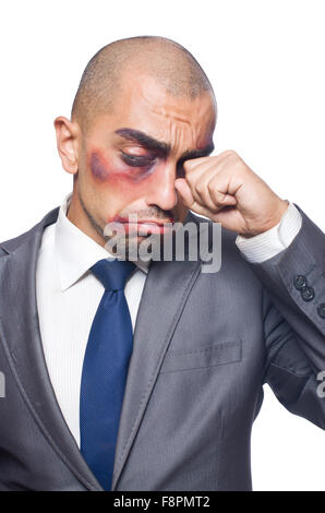 Badly beaten businessman isolated on white Stock Photo - Alamy
