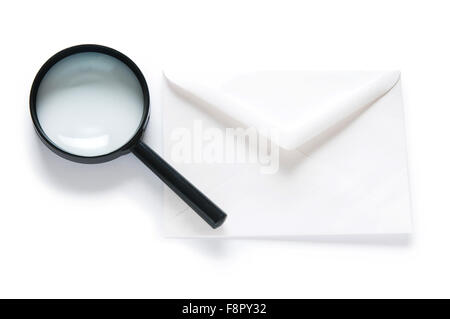 Envlope and magnifying glass isolated on white Stock Photo