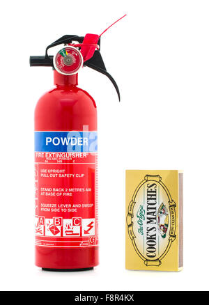 Kidde Dry Powder Fire Extinguisher With a Box of Cooks Matches on a White Background Stock Photo