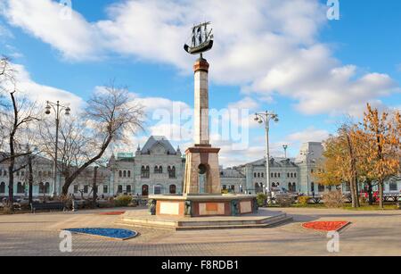 Square in front of the Riga station with a fountain in the form of columns with caravel  on top Stock Photo