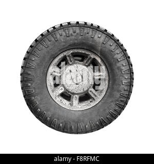 Big dirty off-road car wheel isolated on white background Stock Photo