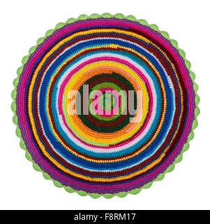 Colorful acrylic knitted crochet rug. Isolated on white background Stock Photo