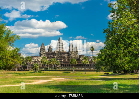 Ancient temple Angkor wat on a sunny day with horse, blue skay and many clouds in Siem Reap. Cambodia
