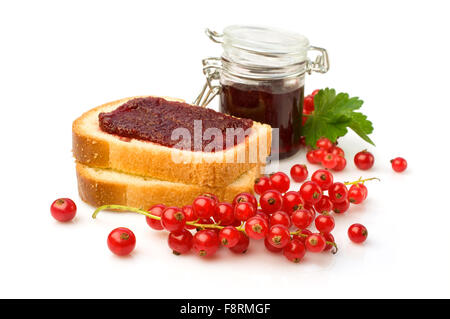 Red currant jam and fresh berries isolated over white Stock Photo