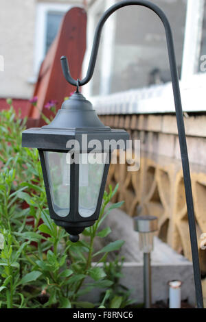 Suspended lamp on pole Stock Photo