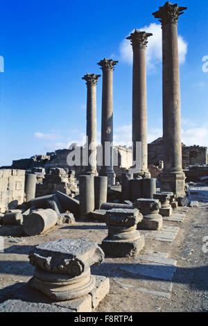 Roman ruins in the town of Bosra, Syria. Bosra is a major archaeological site, containing ruins from Roman, Byzantine, and Muslim times, its main feature being the well preserved Roman theatre. Stock Photo