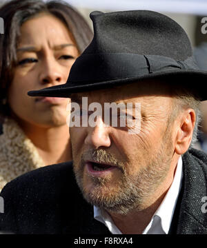 George Galloway, independent candidate for London Mayor 2016, and his wife Putri Gayatri Pertiwi protesting, Whitehall Dec 2015 Stock Photo