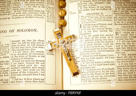 pages of holy Bible and rosary Stock Photo