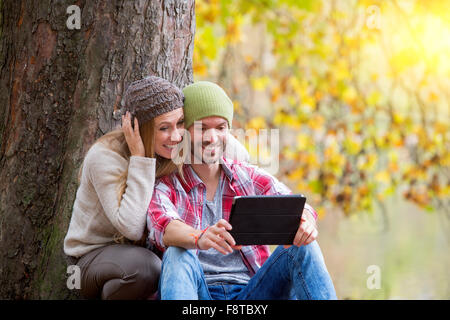 Young couple dating in forest Stock Photo