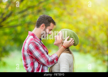Young couple dating in forest Stock Photo