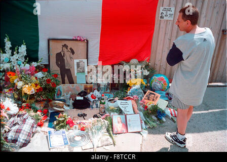 Visitors pay their respects to Frank Sinatra who passed a way on May 14, 1998 after suffering a heart attack.  Residents constructed a shrine on the site in Hoboken where the house that Sinatra grew up in once stood.  December 12, 2015 would be Sinatra's 100th birthday. Stock Photo