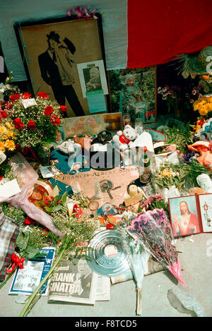 Visitors pay their respects to Frank Sinatra who passed a way on May 14, 1998 after suffering a heart attack.  Residents constructed a shrine on the site in Hoboken where the house that Sinatra grew up in once stood.  December 12, 2015 would be Sinatra's 100th birthday. Stock Photo