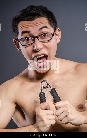 Young man trains isolated on white Stock Photo