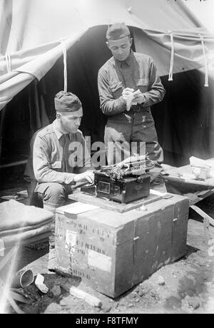 Soldiers work at a typewriter Stock Photo