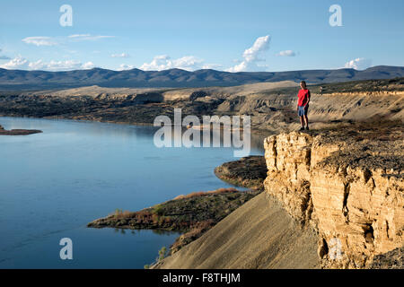 WASHINGTON -  Hiker on the White Bluffs rising above the Columbia River at the Hanford Reach National Monument. Stock Photo