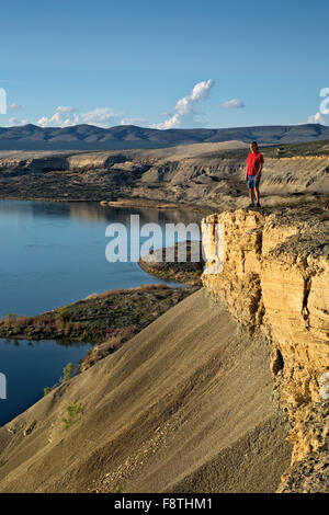 WASHINGTON -  Hiker on the White Bluffs rising above the Columbia River at the Hanford Reach National Monument. Stock Photo