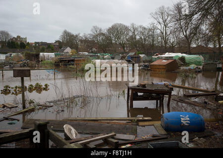 Allotment gardens inundated by flood water damaged by flooding in Carlisle at the beginning of December, 2015. Record rain fall in Cumbria caused flooding to several areas of Carlisle, causing houses to be evacuated by emergency services. Stock Photo