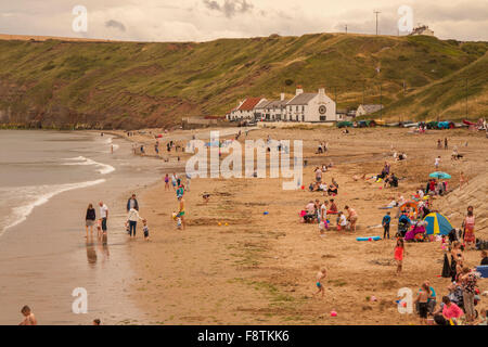 Scenic view of the Beach and Huntcliff at Saltburn by the Sea, Redcar and Cleveland,England,UK showing people on the beach Stock Photo