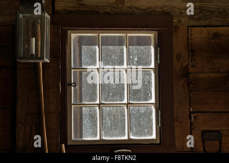 WASHINGTON - Looking out the window of a building at the Fort Nisqually Historic Site, a living history museum now in Tacoma. Stock Photo