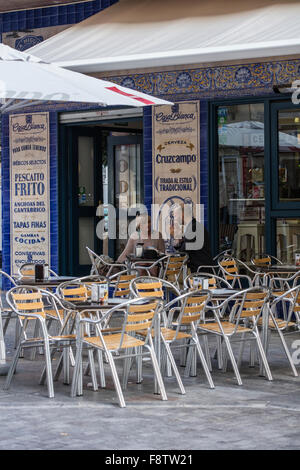 Table and chairs in Marbella Stock Photo - Alamy