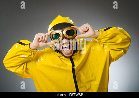 Man wearing yellow suit and aviator glasses Stock Photo