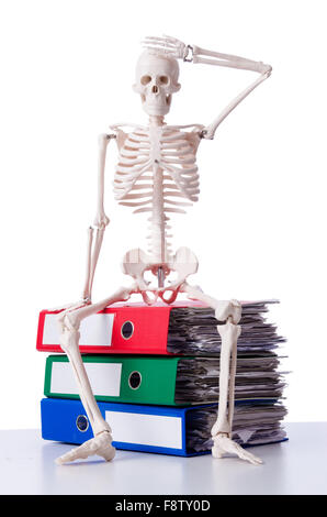 Skeleton with pile of files on white Stock Photo - Alamy