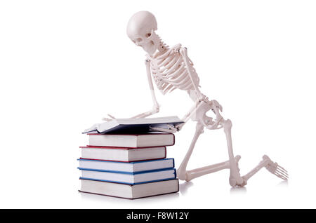 Skeleton reading books on white Stock Photo: 91576357 - Alamy