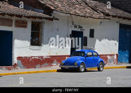 A blue VW Bug parked on the streets of Urubamba Peru. Stock Photo