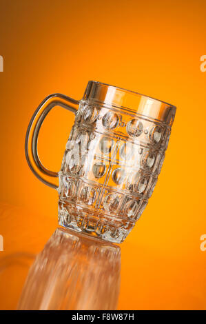 Beer glass against gradient background Stock Photo