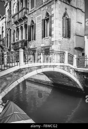 B&W scene from Venice with beautiful bridge in the foreground Stock Photo