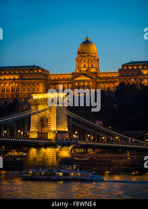 Buda Castle and old chain bridge at dusk, Budapest, Hungary Stock Photo