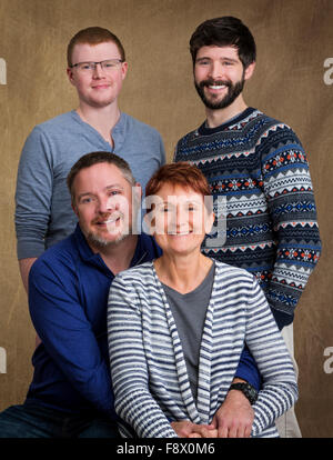 Studio portrait of family including parents and two grown sons Stock Photo