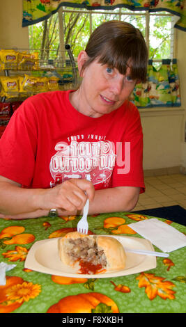 Eating pasty, Butte, Montana Stock Photo