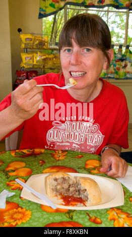 Eating pasty, Butte, Montana Stock Photo