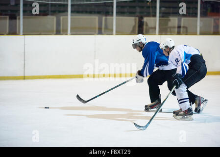 ice hockey sport players in action, business comptetition concpet Stock Photo